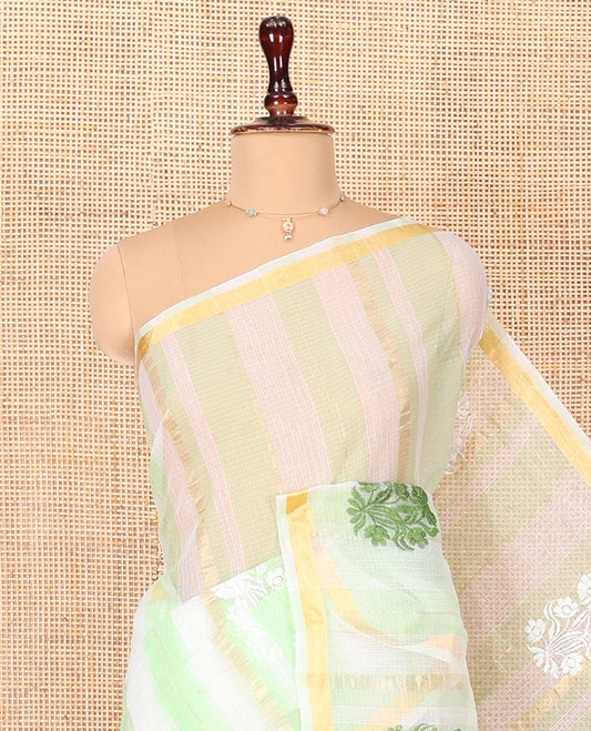 White and Green Kota Cotton Saree, Decorated with Stripes and Floral Motifs Thread Embroidery on Its Body, Piping Border, Pallu Features Floral Embroidery, and Paired with a Matching Blouse