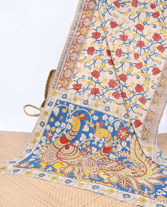 Cream floral vine machine-printed kalamkari cotton saree, contrast tree motifs border & peacock pallu