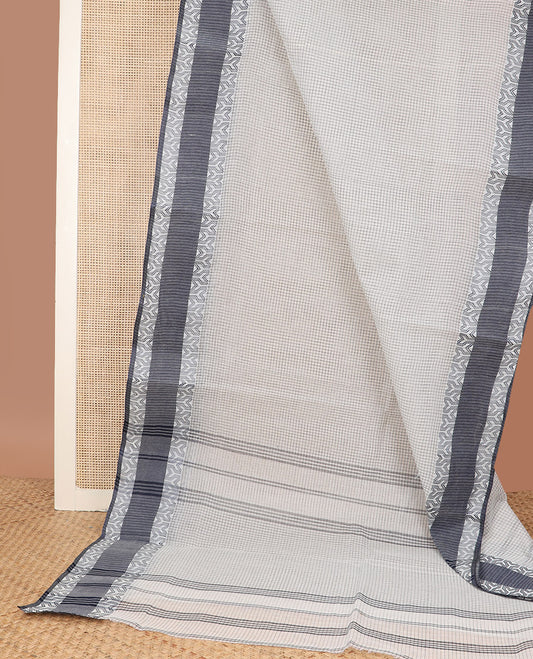 Half-white micro-checked Bengal cotton saree, contrast geometric patterned border, and striped pallu
