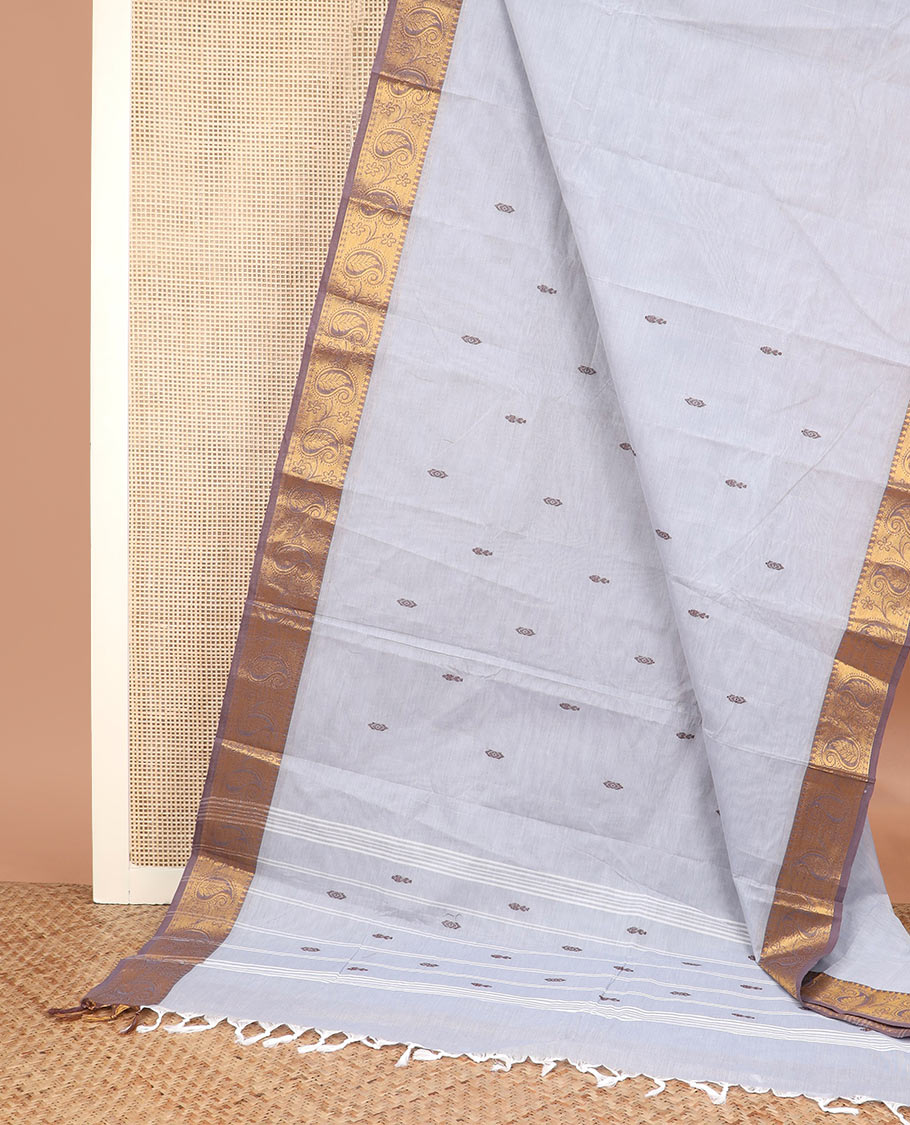 Grey thread buttas Chettinad cotton saree, contrast temple zari border of paisleys, and striped pallu