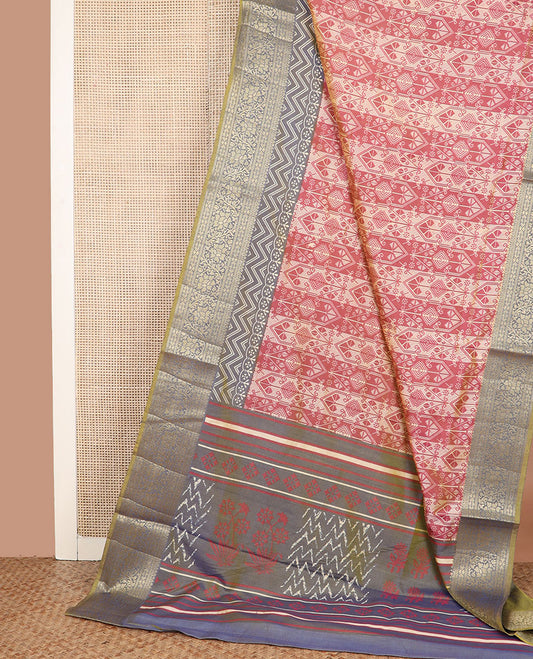 Dark peach intricately designed semi-banaras patola silk saree, contrast floral creeper zari design border, and pallu of chevron and floral designs