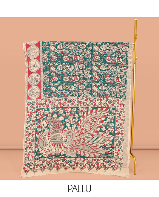 Green Machine-Printed Kalamkari Cotton Saree, Embellished with Flora, Fauna, and Musical Instrument on Its Body, Complemented by a Contrast Round Motifs Printed Border, Pallu of Kalamakri Peacock Print, and Paired with a Printed Blouse