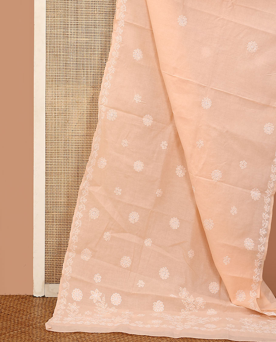 Peach floral thread embroidered buttas Lucknowi chikankari saree, floral creeper thread embroidered border, and floral embroidered pallu