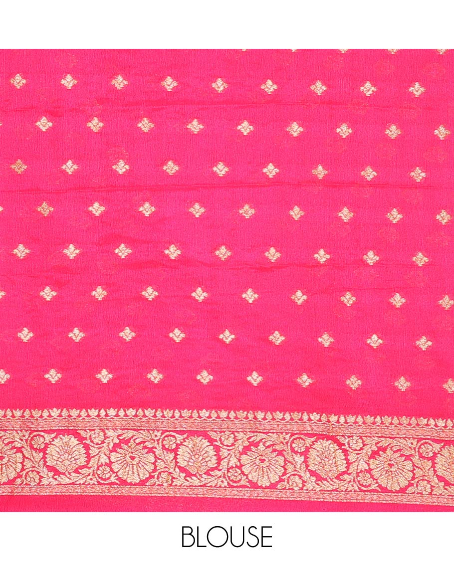 Orange Fancy Georgette Saree Subtly Sparkled with Zari Buttas, Complemented by Contrast Border of Floral  Designs, Zari-Rich Pallu of Floral Jaal Designs, and Paired with a Contrast Blouse