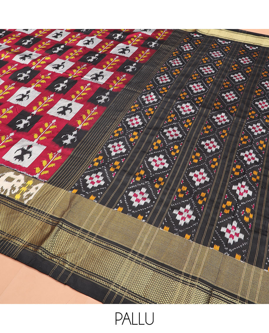 Multi-Colour Ikkat Silk Saree Features Warli Human Buttas and Flower Buttas, a Contrast Border Steeped with Traditional Zari Designs, a Pallu of Diamond Patterns, and a Contrast Blouse