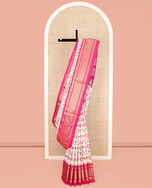 Pale Yellow Ikkat Silk Saree, Charmingly Accented with Colorful Ikkat Design Weave, Complemented by a Contrast Temple Border of Diamond Designs, Pallu Features Ikkat Diamond Designs, and Paired with a Contrast Blouse