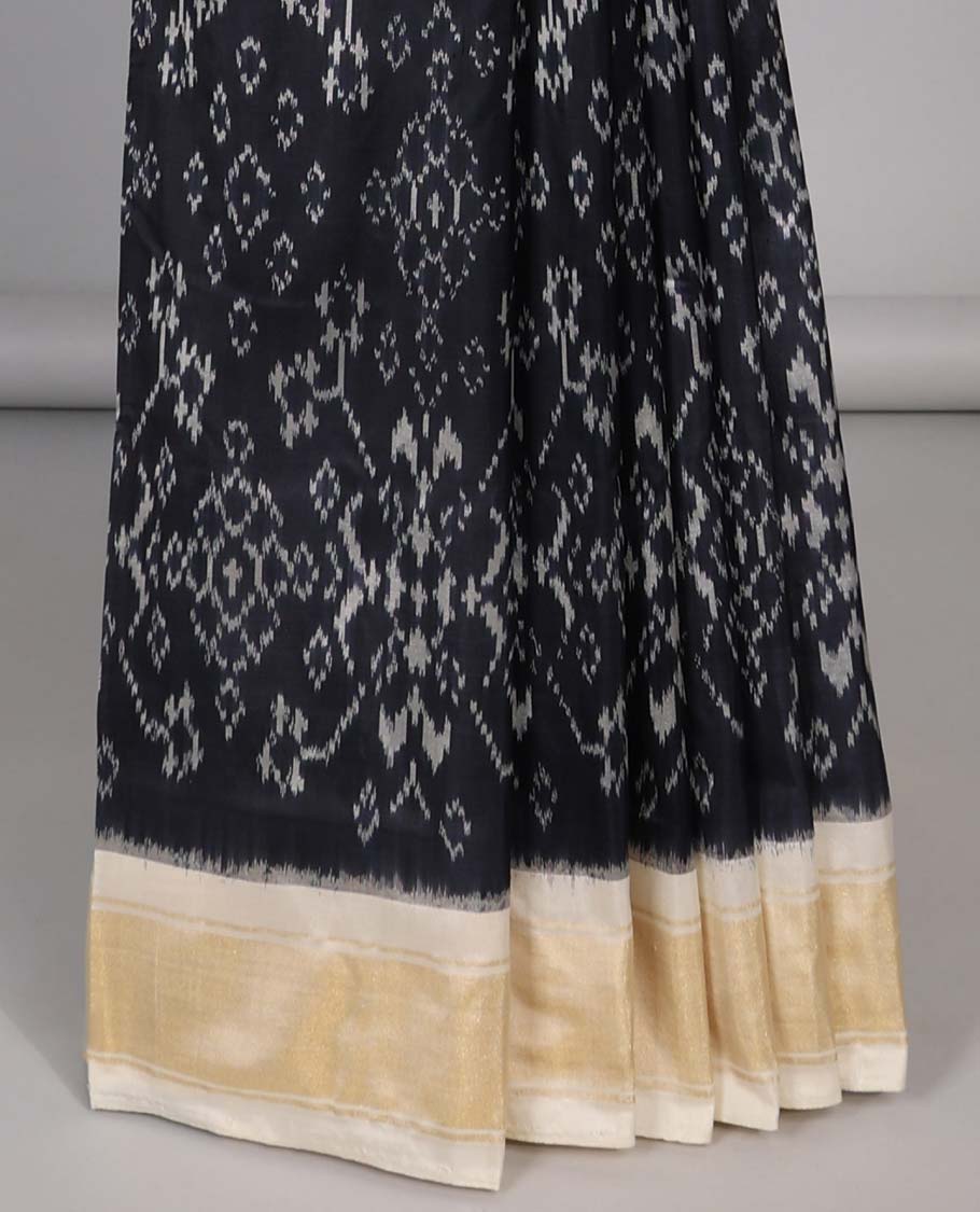Black intricate floral design ikkat silk saree with contrast plain border & striped , intricate design pallu