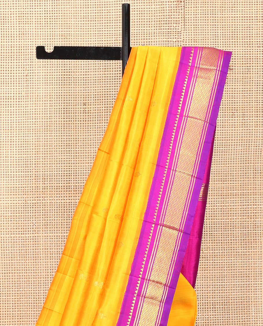 Yellow Kanchipuram Silk Saree, Delicately Woven with Zari Buttas, a Contrast One-Sided Korvai Border of Rekku, Banaras, and Jaal Designs, a Zari Design Pallu, and No Blouse