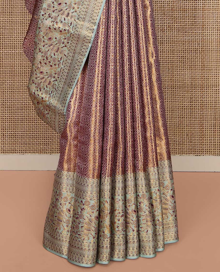 Copper Kanchipuram Tissue Silk Saree, Complemented by Contrast Meenakari Floral and Peacock Design Border, Grand Jaal Pallu and Paired with a Contrast Blouse