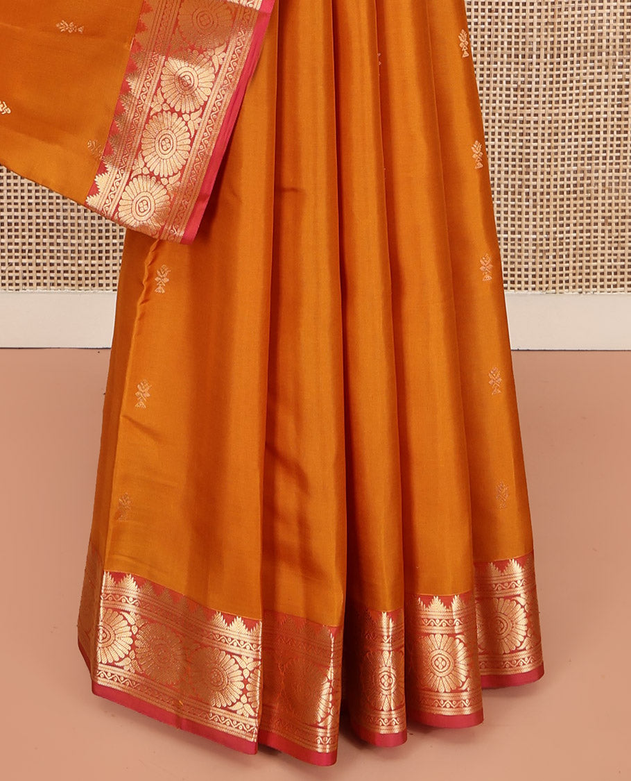 Orange Kanchipuram Silk Saree, Woven with Zari Buttas All Over Its Body, Complemented by a Contrast Border of Thazampoo Rekku, Banaras, Neli, and Chakram Designs, Intricately Designed Pallu, and Paired with a Contrast Blouse