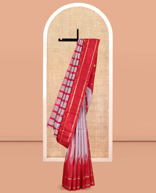 Grey Kanchipuram Silk Saree Featuring Zari Buttas, Complemented by a Contrast One-Sided Thazampoo Rekku Rettai Pettu Border, Zari Design Pallu, and a No Blouse