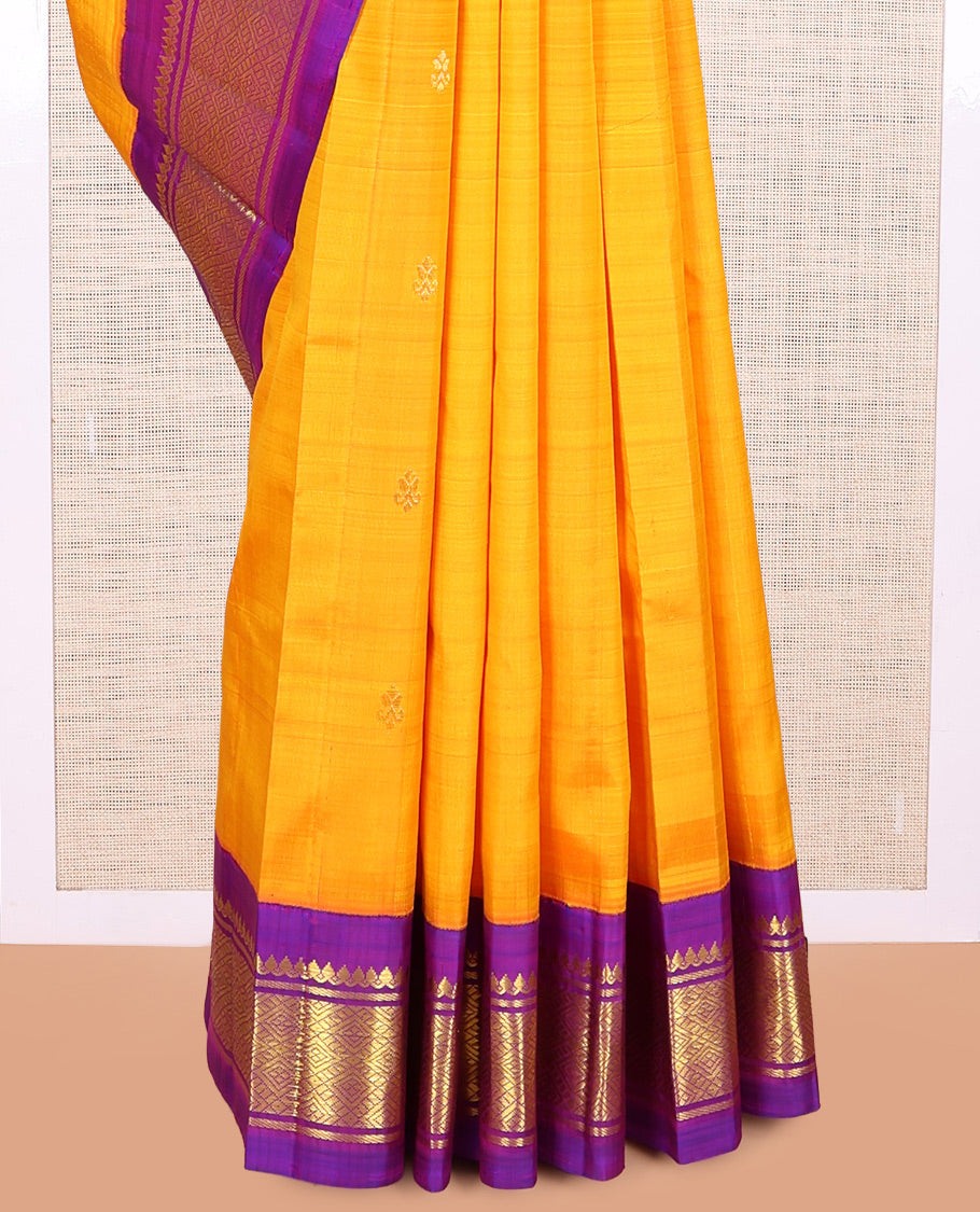 Yellow Kanchipuram Silk Saree, Gleamed Up with Zari Buttas, a Contrast Korvai Border of Thilakam Mokku, Banaras, and Jaal Designs, Zari Woven Pallu, and No Blouse