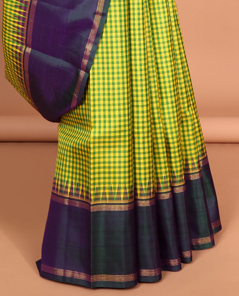 Green checked kancheepuram silk saree with contrast striped border & striped zari pallu