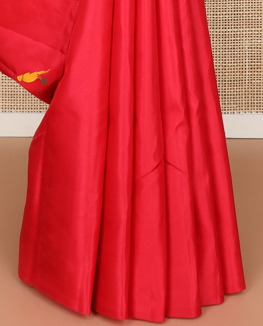 Borderless red parrot buttas kancheepuram silk saree with intricate floral design pallu