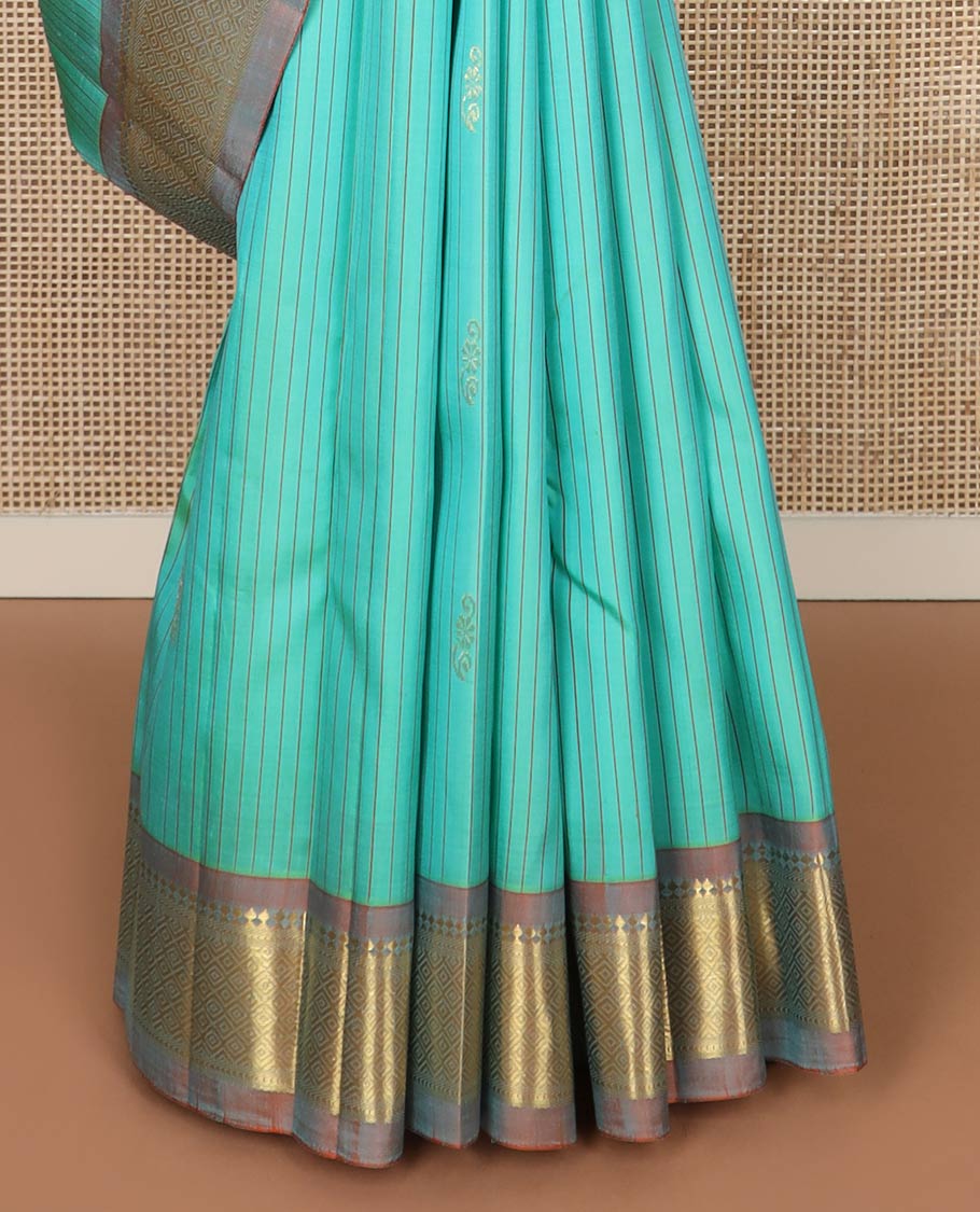 Blue stripes & buttas silk saree, contrast one-sided border of panner sombu, kathir & jaal & zari design pallu