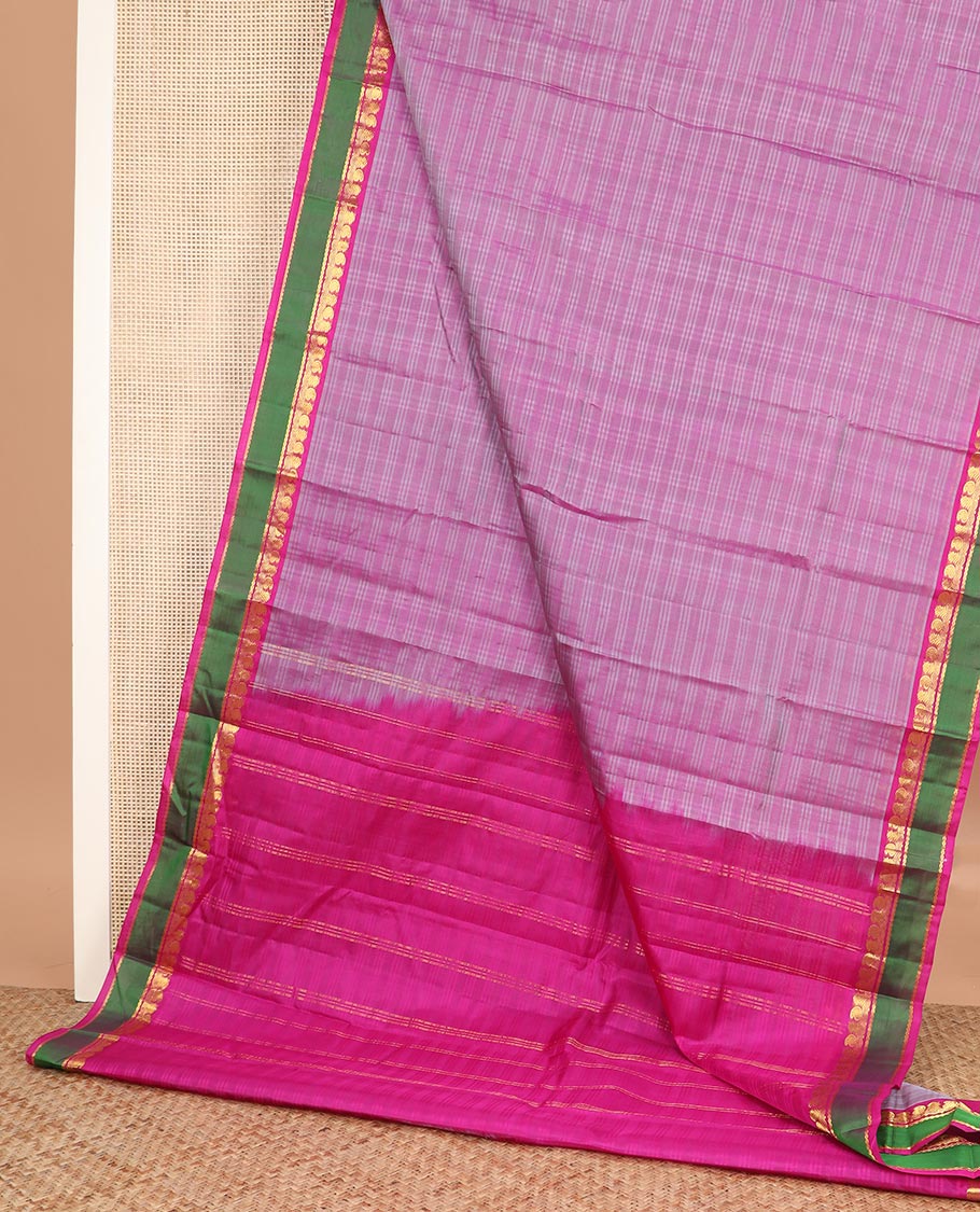 Pink striped Kanchipuram silk saree, contrast rettai pettu border of zari designs, and zari striped pallu