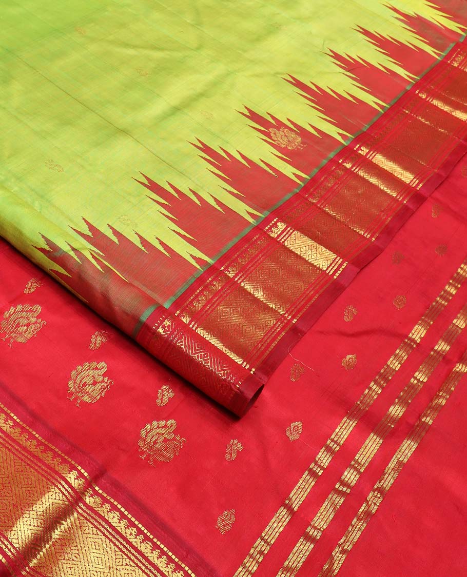 Green zari buttas Kanchipuram silk saree, contrast one-sided thazampoo rekku border of muthu, banaras, and jaal designs, and zari design pallu