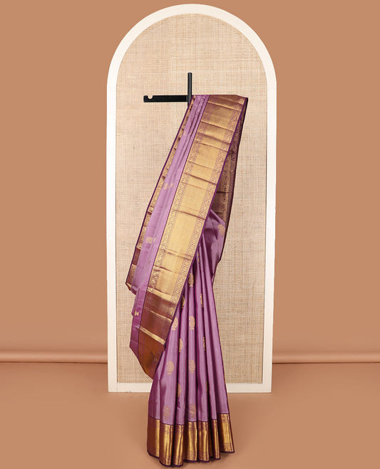 Purple manga buttas Kanchipuram silk saree, contrast border of kathir,  and annam chakram designs, and zari-rich jaal pallu