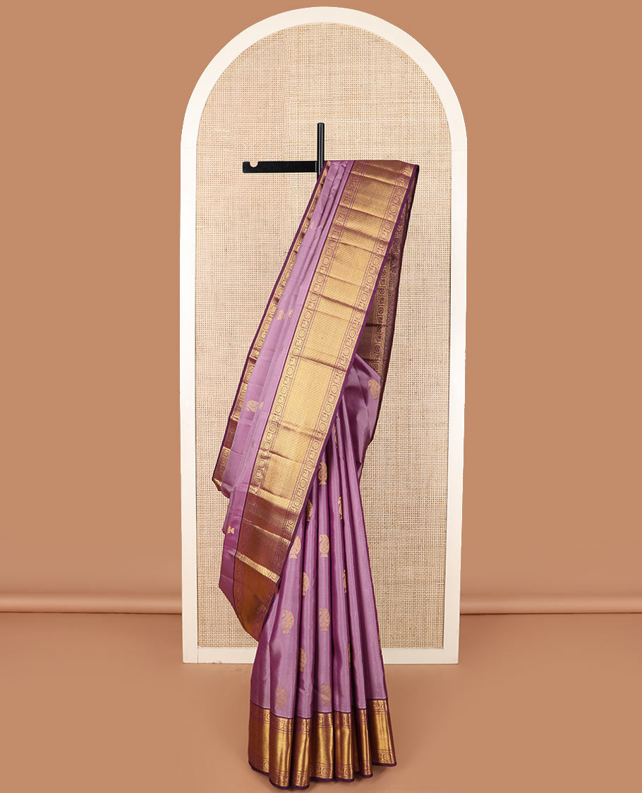 Purple manga buttas Kanchipuram silk saree, contrast border of kathir,  and annam chakram designs, and zari-rich jaal pallu
