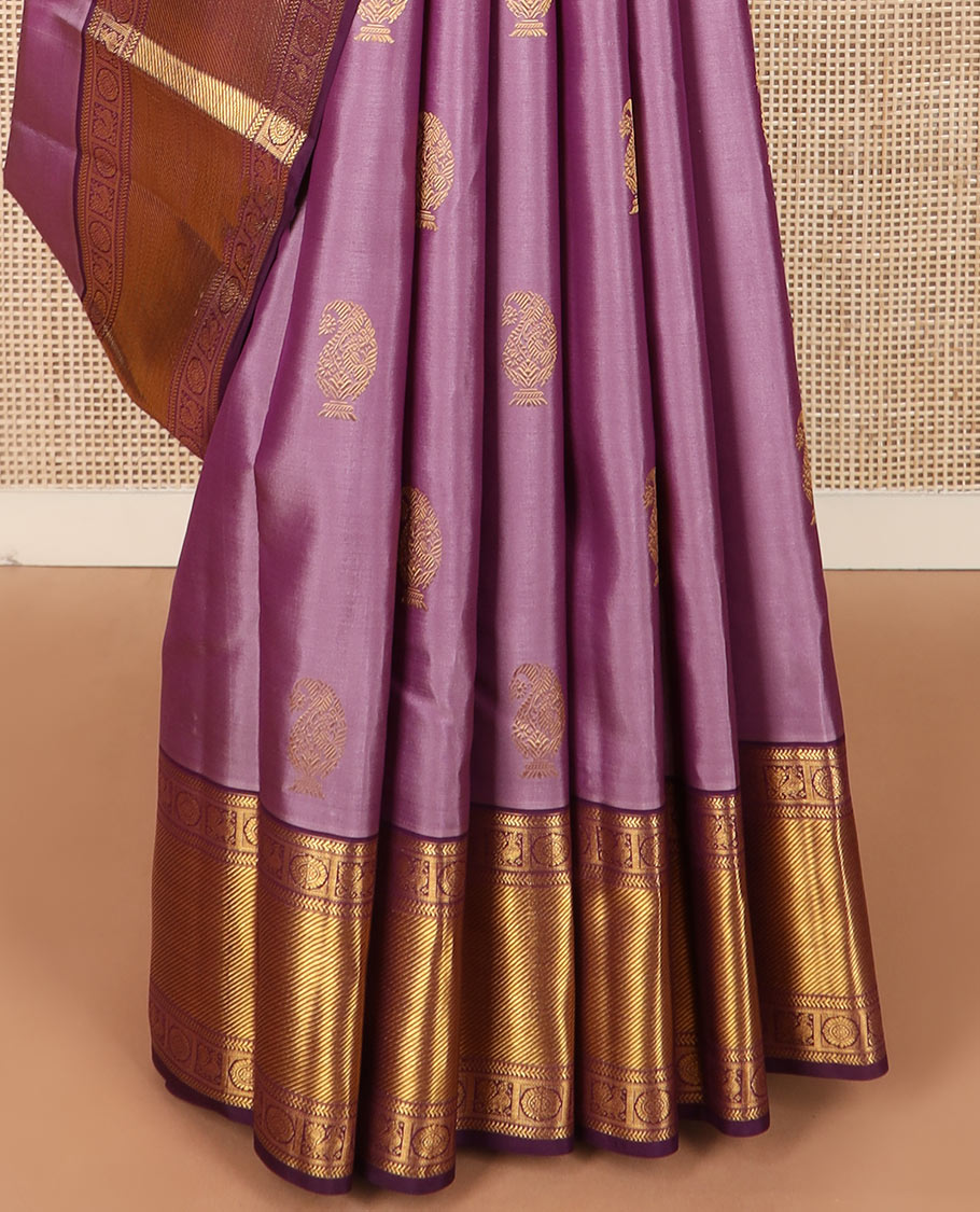 Purple manga buttas Kanchipuram silk saree, contrast border of kathir,  and annam chakram designs, and zari-rich jaal pallu
