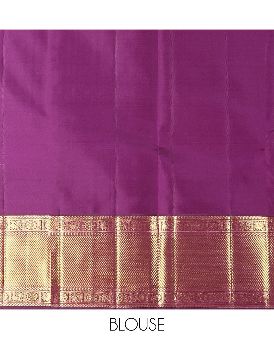 Purple manga buttas Kanchipuram silk saree, contrast border of kathir,  and annam chakram designs, and zari-rich jaal pallu