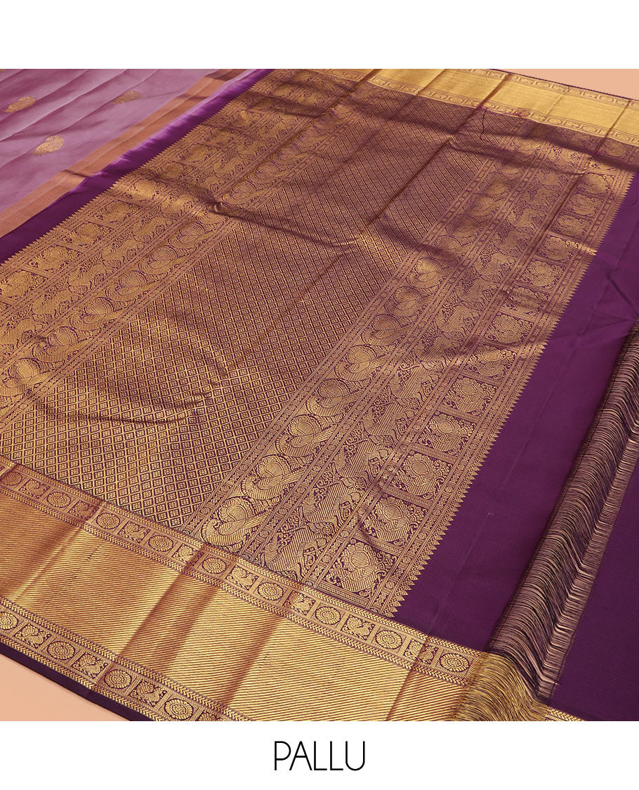 Purple manga buttas Kanchipuram silk saree, contrast border of kathir,  and annam chakram designs, and zari-rich jaal pallu