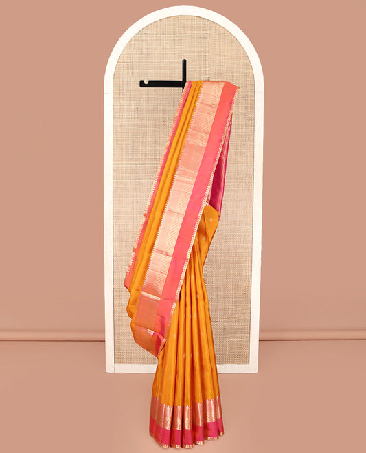 Mango Yellow Kanchipuram Silk Saree, Adorned with Zari Buttas All Over Its Body, Complemented by Contrast Border of Traditional Zari Designs, Grand Diagonal Striped Pallu, and Paired with a Contrast Blouse