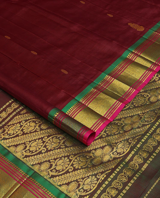 Maroon zari buttas Kanchipuram silk saree, contrast one-sided border of panner sombu,banaras,muthu Jaal & kodi visiry pallu