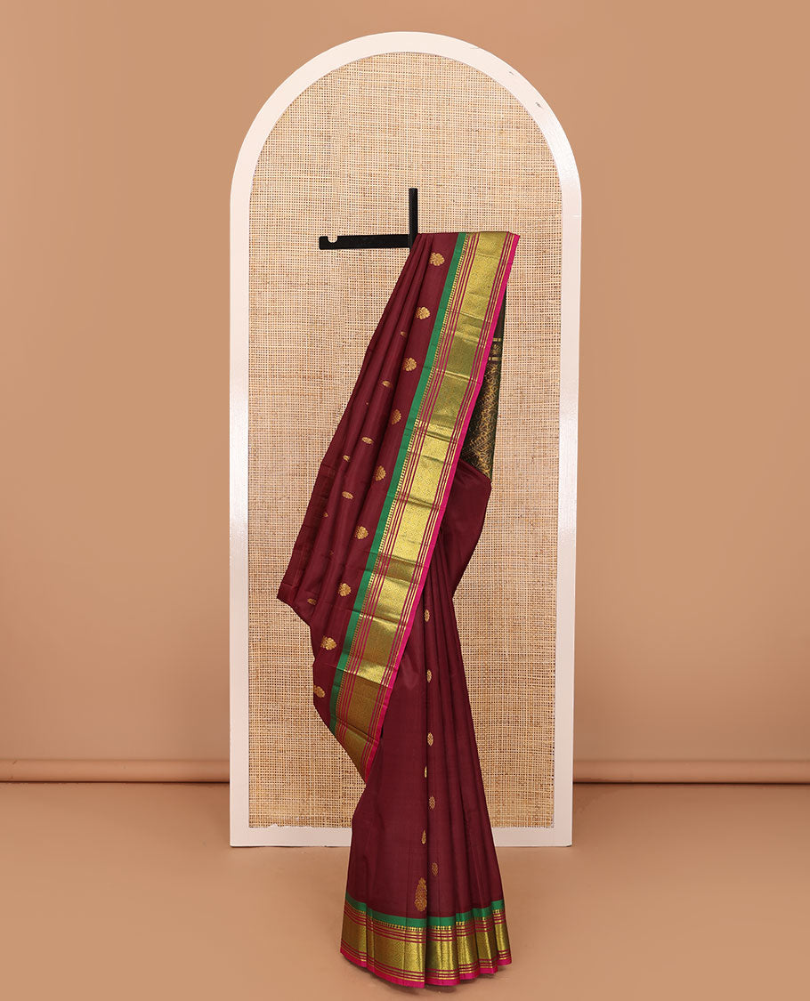 Maroon zari buttas Kanchipuram silk saree, contrast one-sided border of panner sombu,banaras,muthu Jaal & kodi visiry pallu