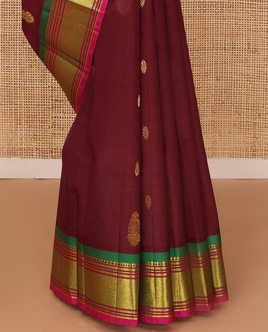 Maroon zari buttas Kanchipuram silk saree, contrast one-sided border of panner sombu,banaras,muthu Jaal & kodi visiry pallu