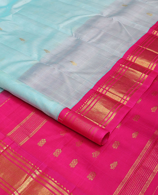 Baby blue  zari buttas Kanchipuram silk saree, one-sided thazampoo rekku zari border & zari design pallu