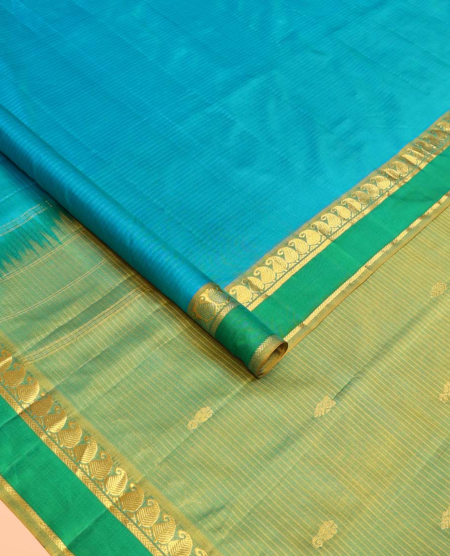 Blue striped Kanchipuram silk saree, contrast rettai pettu border of vanki manga, and kathir designs, and zari design pallu