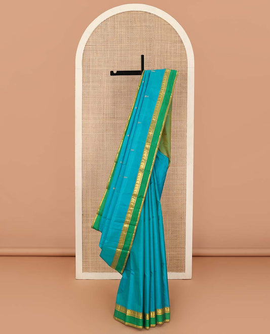 Blue striped Kanchipuram silk saree, contrast rettai pettu border of vanki manga, and kathir designs, and zari design pallu