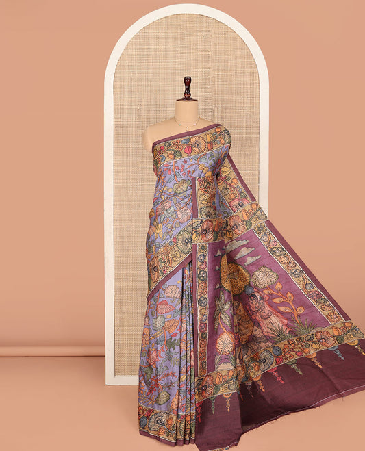 Lavender Semi-Tussar Saree Artfully Printed with Kalamkari-Style Colorful Floral Print, Complemented by a Contrast Floral Printed Border, Pallu Depicting Krishna and Gopis Print, and Paired with a Contrast Printed Blouse