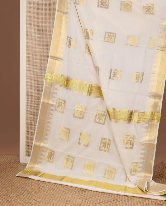 Cream zari Pichwai lotus buttas Kerala saree, zari temple border, and pallu of Pichwai lotus motifs