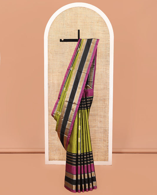 Green Mayuri Soft Silk Saree, Woven with Zari Buttas All Over Its Body, Complemented by a Contrast Border of Traditional Zari Designs, Pallu of Vanki Designs, and Paired with a Contrast Blouse