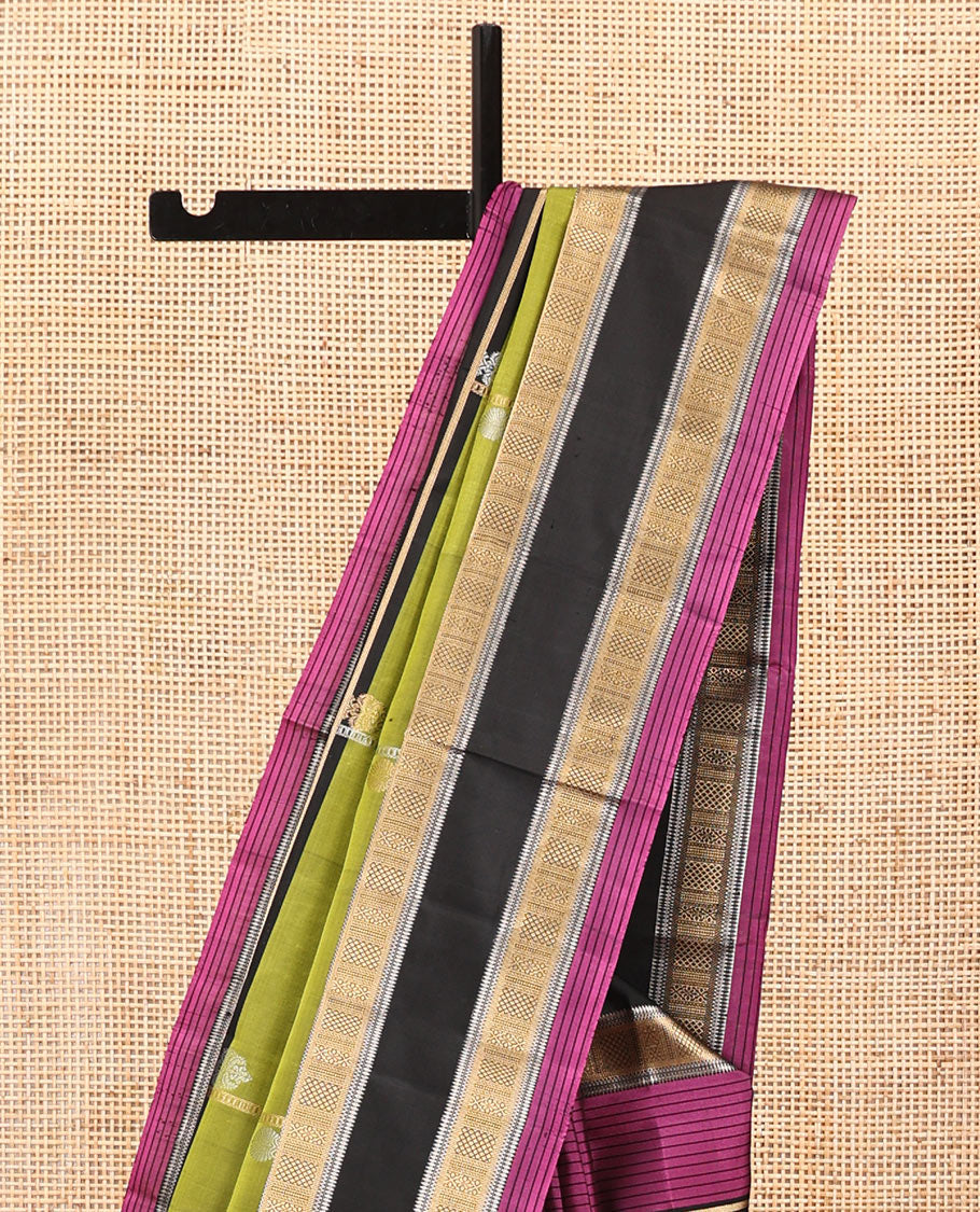 Green Mayuri Soft Silk Saree, Woven with Zari Buttas All Over Its Body, Complemented by a Contrast Border of Traditional Zari Designs, Pallu of Vanki Designs, and Paired with a Contrast Blouse