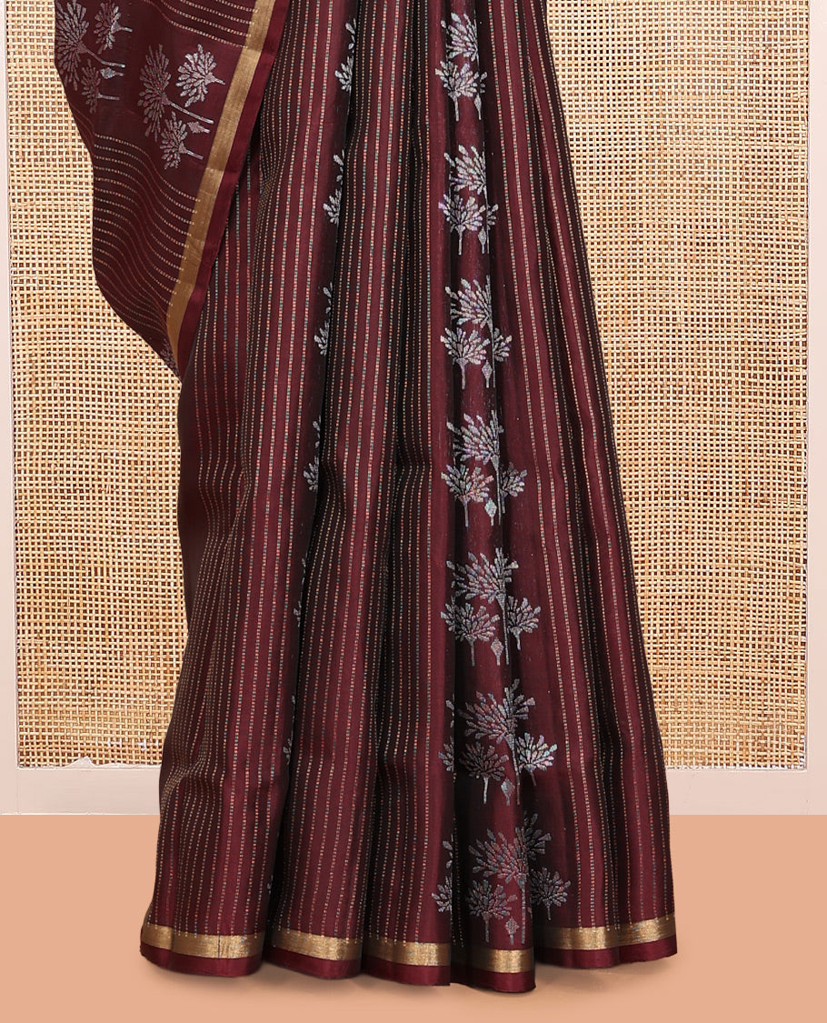 Brown Mayuri Lite Silk Mix Saree, Showcasing Floral Zari Buttas and Stripes, a Piping Border, a Grand Pallu, and a Matching Blouse