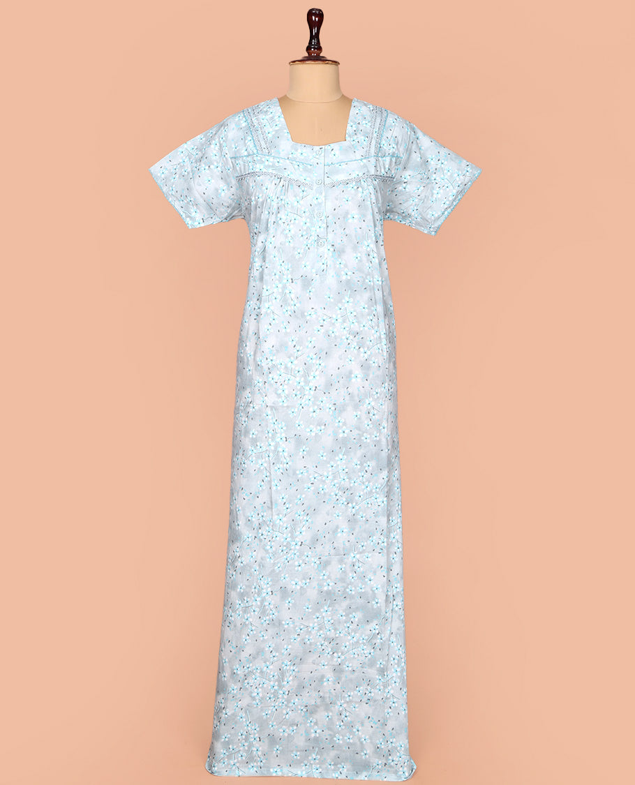 Pale Blue Cotton Nighty Subtly Sparkled with Floral Print, Featuring Lace Work, Square Front Neck, and Half  Sleeves