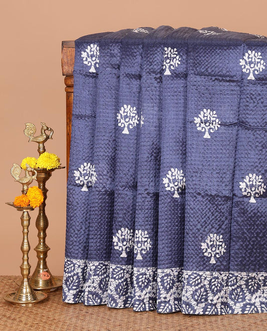 Blue batik-style tree motif printed litch crushed saree, leaf print border, floral-geometric print pallu & floral print blouse