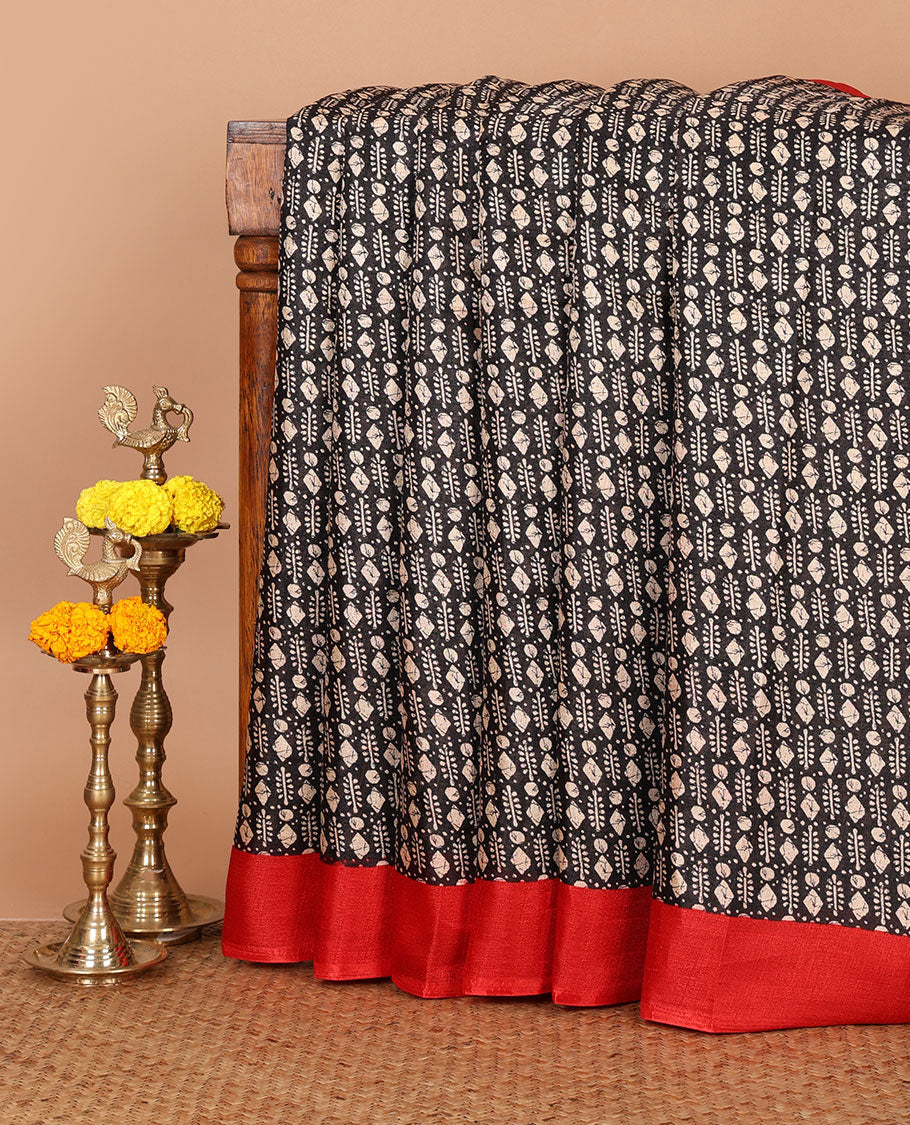 Black batik-style geometric motifs block printed khadi cotton saree,contrast border, batik floral print pallu & plain red blouse