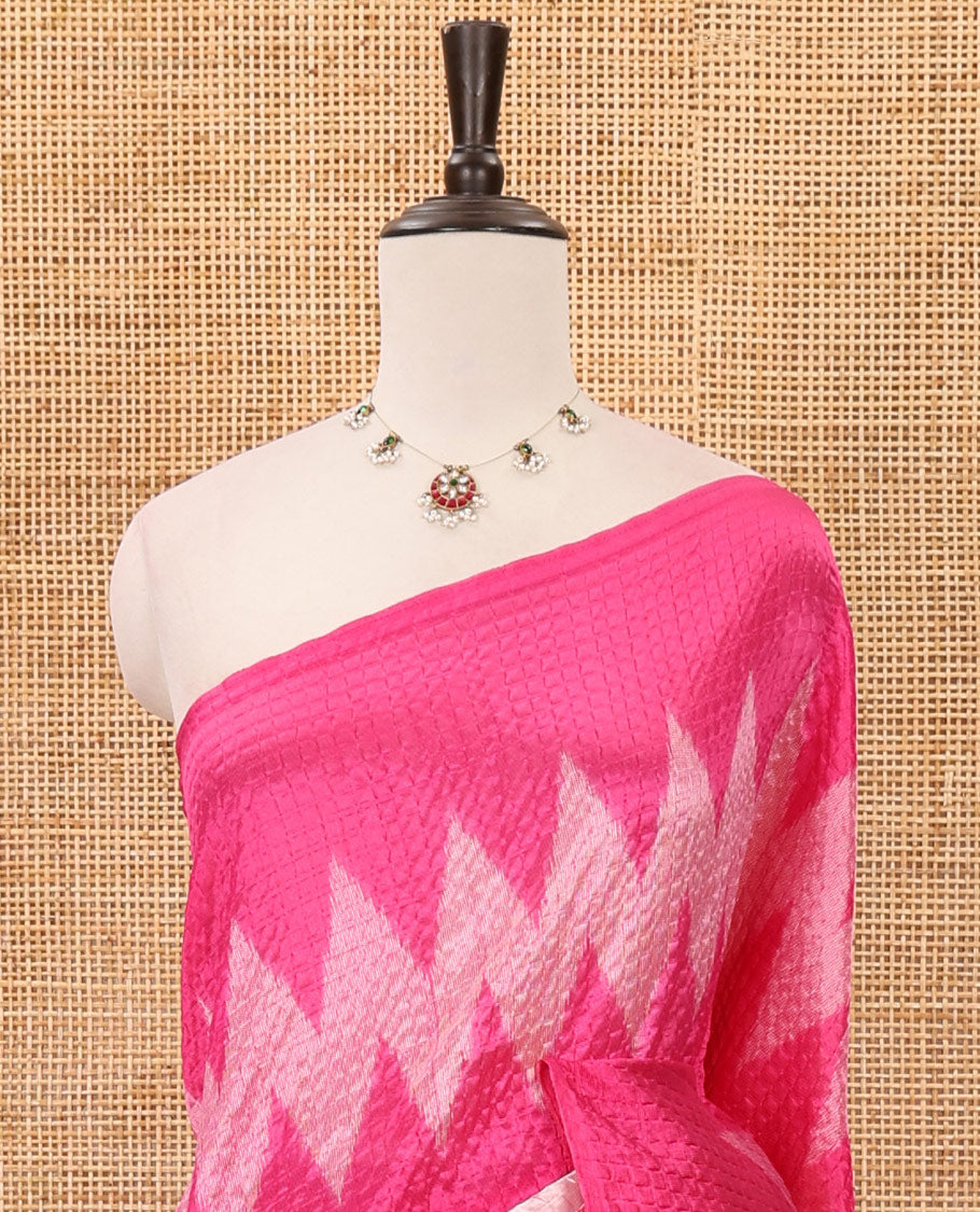 Borderless white 3-layer ikkat chevron printed litchi crushed saree, ikkat printed pallu & small butta printed pink blouse