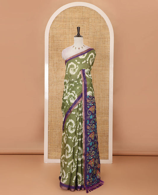 Olive green shibori-style printed linen cotton saree, contrast zari piping border, kamlamkari floral printed pallu & contrast printed blouse