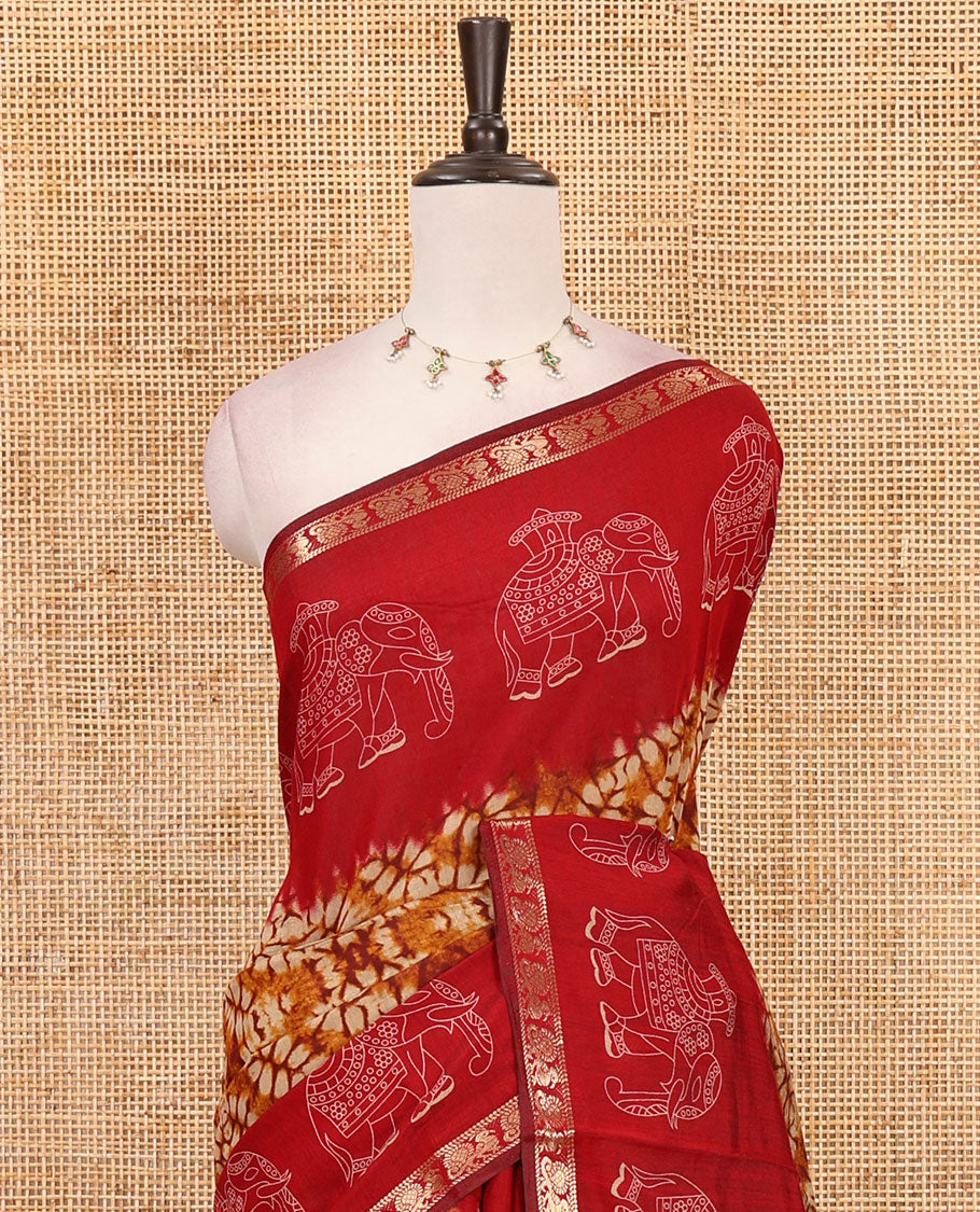 Mustard diamond patterns Shibori-style printed muslin cotton saree, contrast elephant motifs printed border, batik elephant motifs pallu & contrast flower buttas printed blouse
