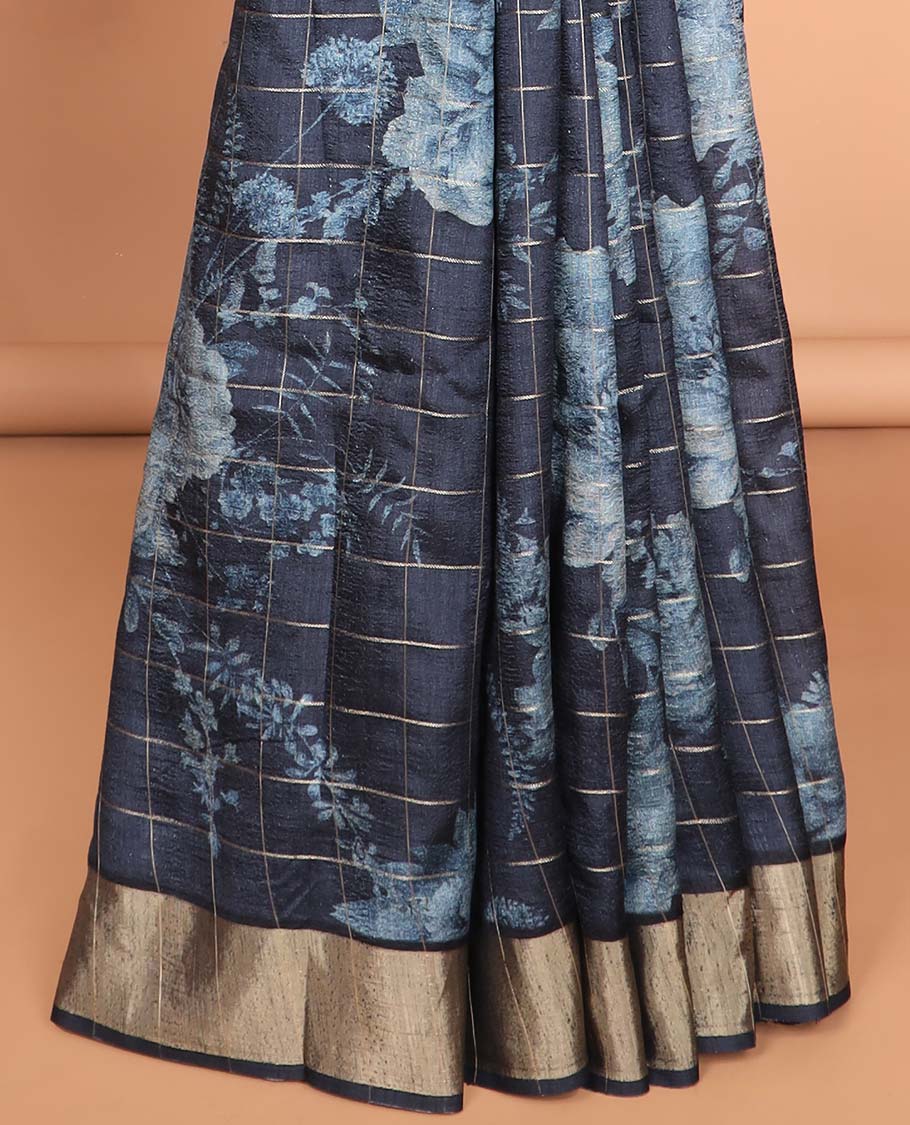 Navy blue checks with floral printe semi tussar saree, gold zari bawanchi border & printed pallu along with checked blouse