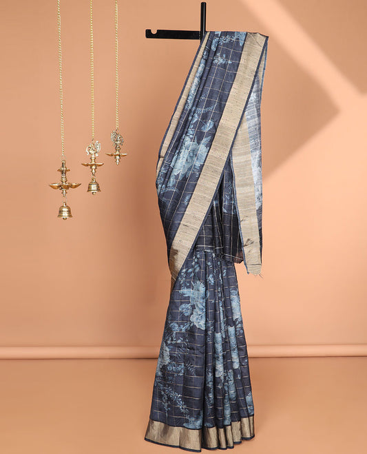 Navy blue checks with floral printe semi tussar saree, gold zari bawanchi border & printed pallu along with checked blouse
