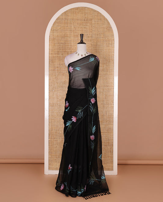 Borderless black floral motifs  hand brush painted semi-organza saree comes with tasseled pallu and without blouse