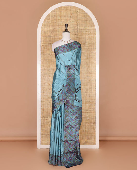 Teal blue abstract style geometric printed Turkey crepe saree, contrast border, and pallu of abstract textured print