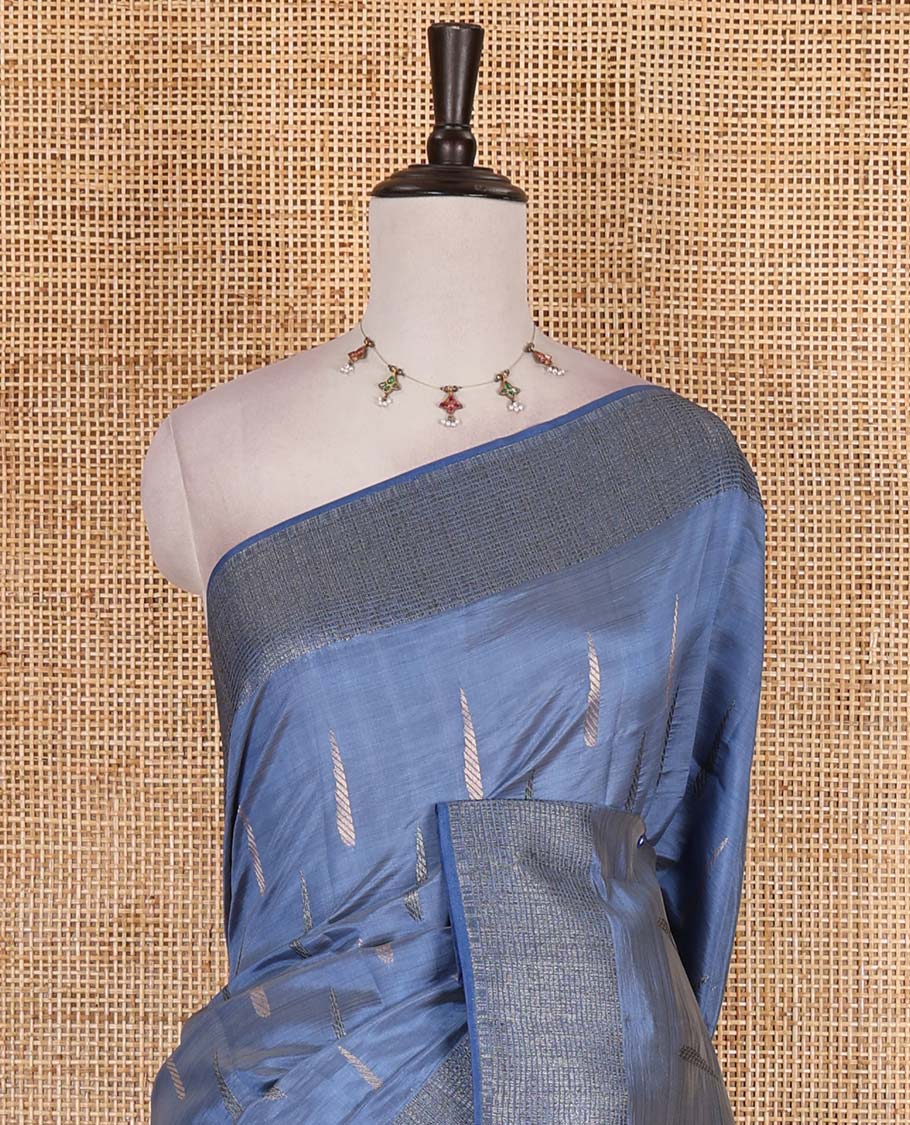 Blue buttas woven semi-tussar saree, zari border, geometric patterned pallu, and a matching blouse