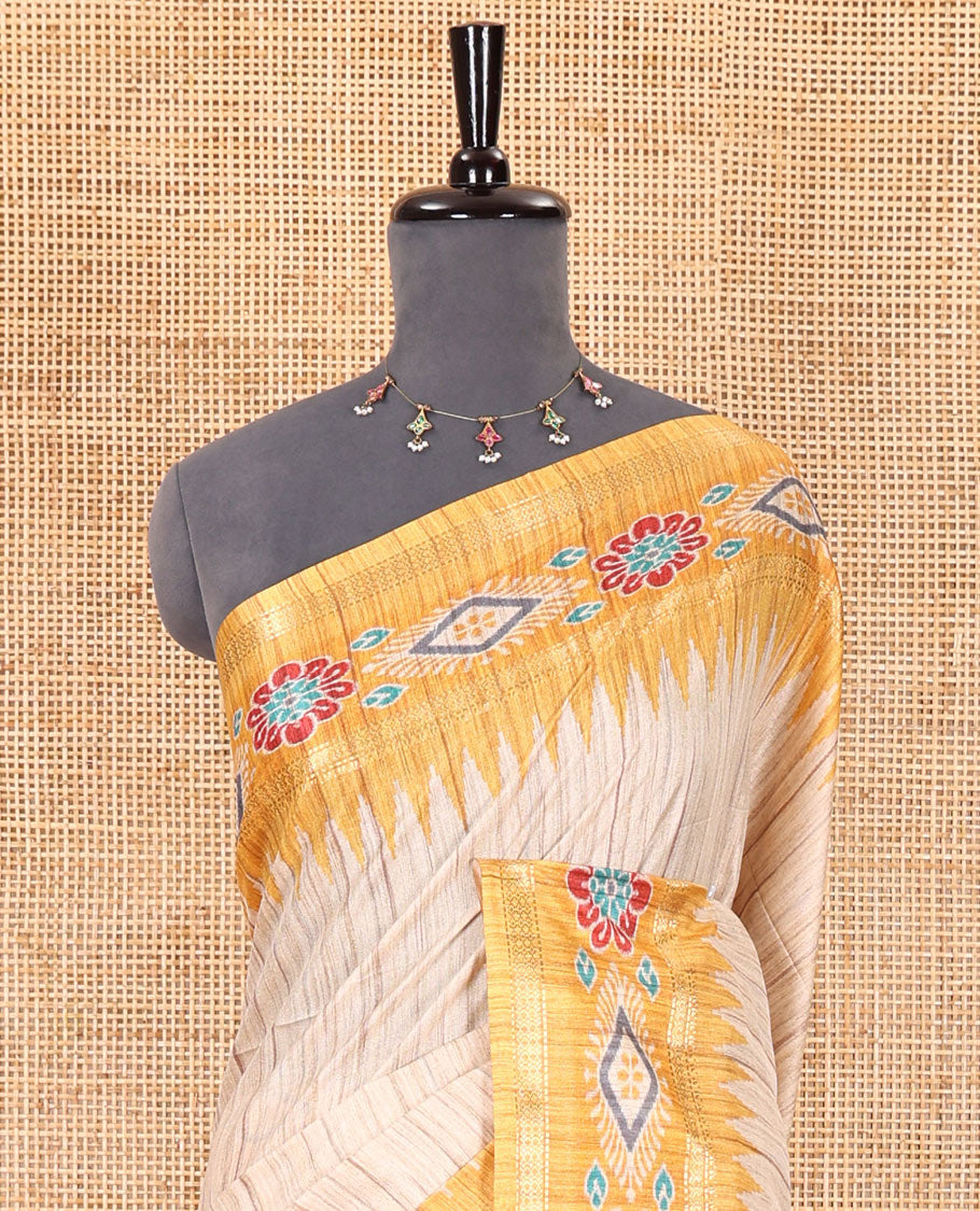 Chikku- yellow plain Katan silk saree, contrast ikkat floral-geometric printed temple border, ikkat printed pallu, and ikkat printed blouse